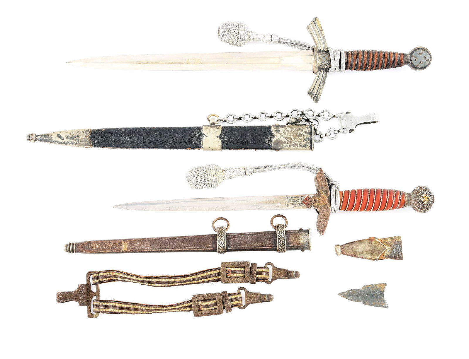 LOT OF 4: THIRD REICH LUFTWAFFE FIRST AND SECOND MODEL: Lot contains: (A) Luftwaffe 1st Model dagger with a "MWM, WAFFEN" marked blade, with moderate to heavy runner and scattered marks, and light freckling. Blue leather wire wrapped grip retains approxima