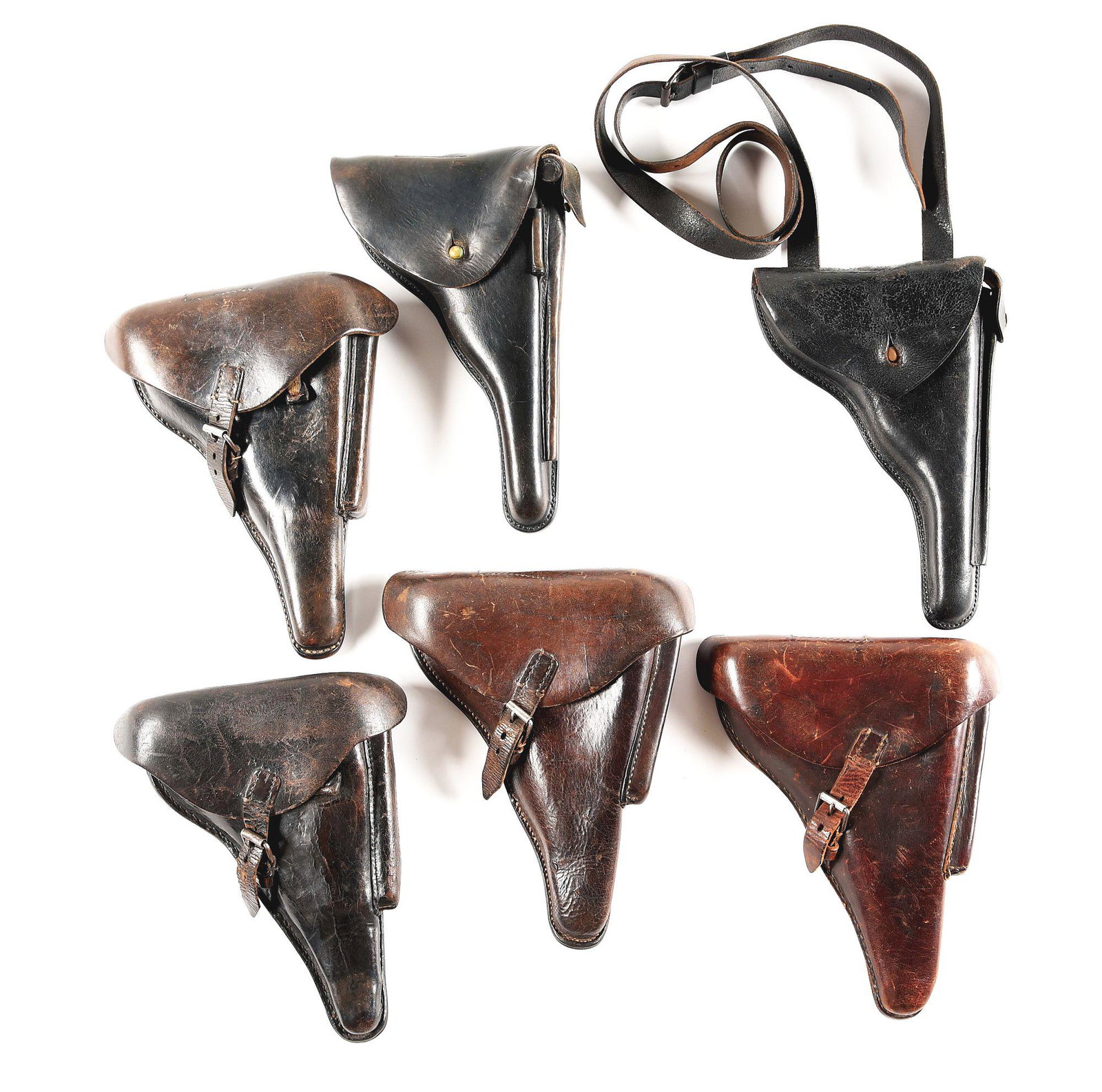 LOT OF 6: LUGER HOLSTERS.: Lot consists of: (A) German WWII 2-piece black Luger holster marked "HANS ROMER", "1940", "WaA788", and "5635" under the left belt loop, with intact pull-up strap, loading tool pouch, belt loops, and 
