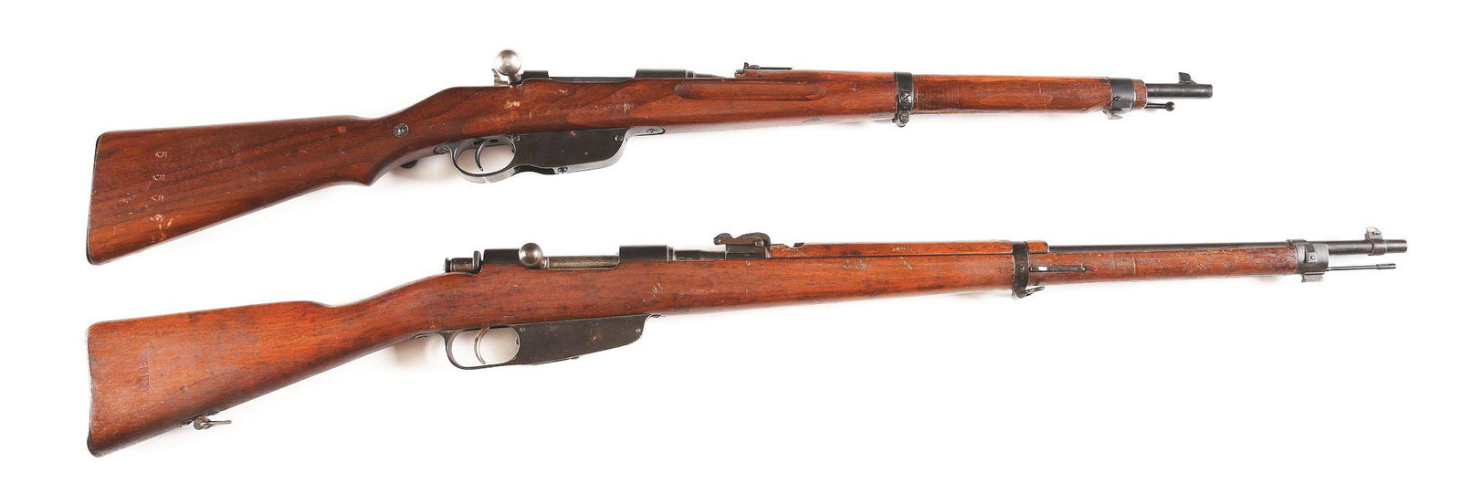 (C) LOT OF 2: STEYR MODEL 1895/30 CARBINE AND CARCANO: Lot consist of: (A) Steyr Model 1895/30 straight pull bolt action carbine. Made at the Steyr factory circa 1919. The rifle was later updated for the M30 cartridge, noted by the "S" on the chamber. Cha