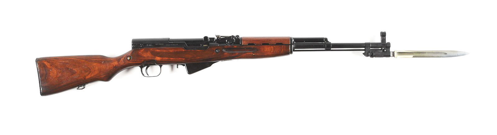 (C) RUSSIAN "1954" DATED IZHEVSK SKS SEMI-AUTOMATIC: Standard configuration SKS semi-automatic rifle manufactured by Izhevsk in 1954. Receiver cover bears the Izhevsk arsenal emblem above "1954r". Arsenal refurbishment stamp is present on the receiver c