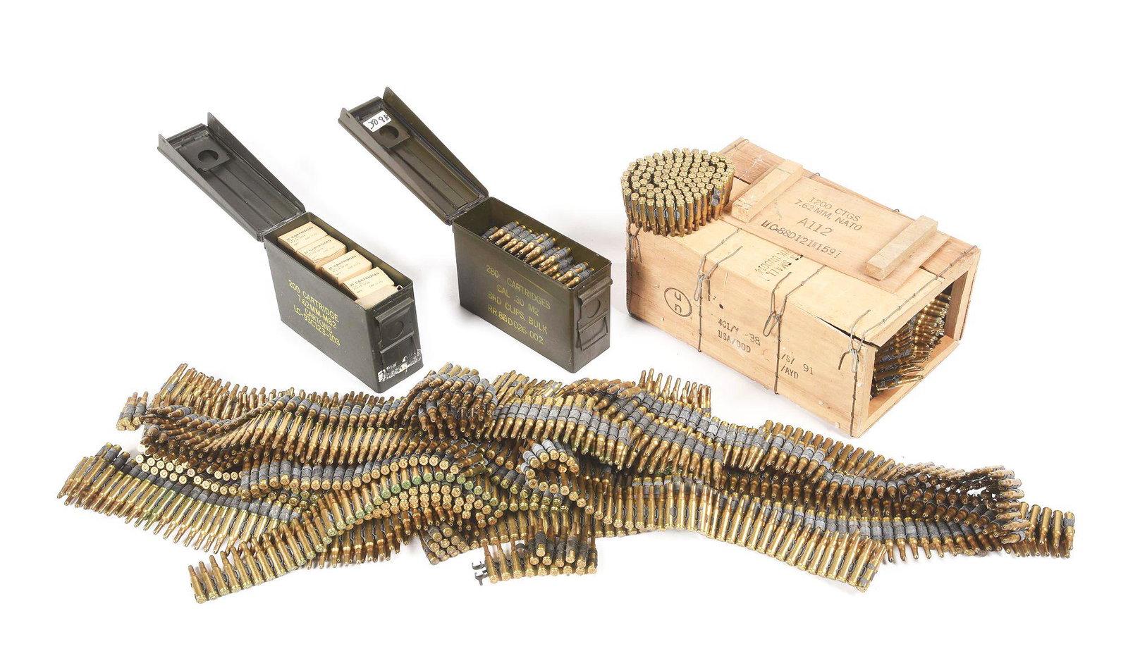 LOT OF APPROXIMATELY 3000 BELTED .308 (7.62 X 51 MM): Approximately 3000 rounds military surplus .308 blanks purchased by consignor years past for re-enacting. One military crate containing 1200 blanks. 1 steel G.I. can with 200 blanks on M-60 belt. 1 G.