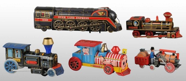 Lot of 5: Tin Train Engines in O/B: Japanese. Battery-operated and friction. Nice lithography and very little wear overall. Includes all original boxes. Largest: 16" L. (Excellent).