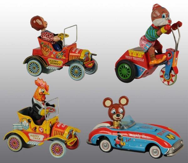 Lot of 4: Tin Litho Animal Vehicle Toys.: Japanese. Working. Includes one Happy Chick Car, one Happy Monkey Car, one Mighty Bear Car, and one Bear Tricycle Toy. Minor scratching and wear. Largest: 7 - 1/2" L. (Very Good - Excellent).