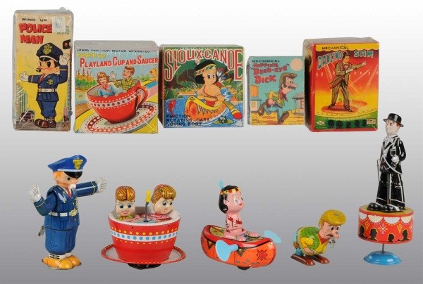 Lot of 4: Tin Litho Character Toys in O/B: Japanese. Working. Includes one Dead Eye Dick, one Dancing Sam, one Policeman, one Indian in Canoe, and one Playland Cup and Saucer Toy. Very little wear overall. Includes all original boxes. Largest: