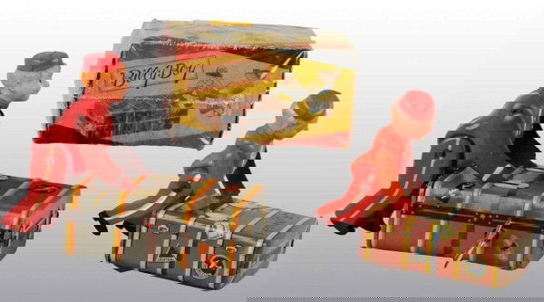 Lot of 2: Celluloid & Tin Baggage Men Toys.: Japanese. Wind-up mechanisms are working. Includes one Billy Boy in original box. Nice lithography on suitcases. Largest: 4 - 1/4" L. (Excellent).