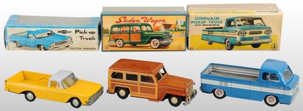 Lot of 3: Tin Litho Truck Friction Toys O/B: Japanese. Working. Includes one Corvair, one Chevrolet, and one Yonesowa Woody Sedan Station Wagon with opening back tailgate. Very little wear overall. Includes all original boxes. Largest: 8" L. (Ex