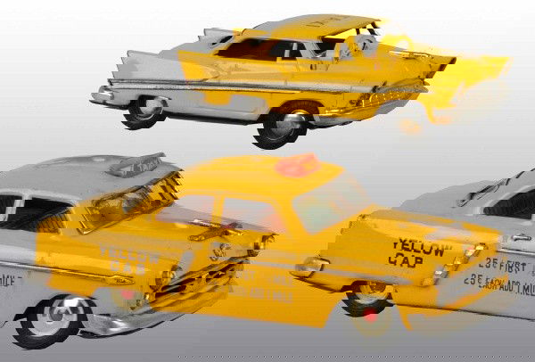 Lot of 2: Tin Litho Taxi Friction Toys.: Japanese. Working. Made by Marusan. Includes one Chevrolet with taxi meter on hood and one Yellow Cab with taxi meter in front window. Dent to roof of one car and moderate scratching and wear througho