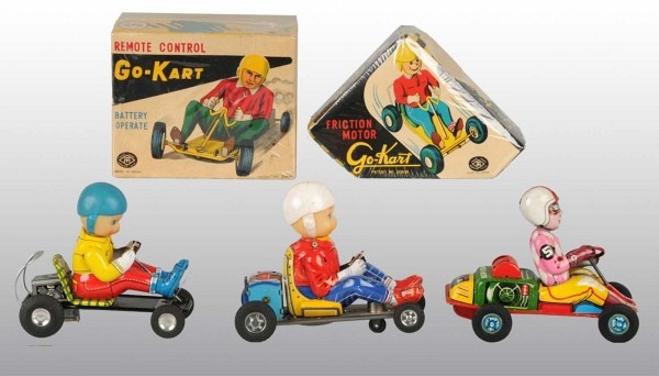 Lot of 3: Tin Go-Kart Toys.: Japanese. Working. Includes two friction and one battery-operated. Includes two all original boxes. Each: 6 - 1/2" L. (Very Good - Excellent).