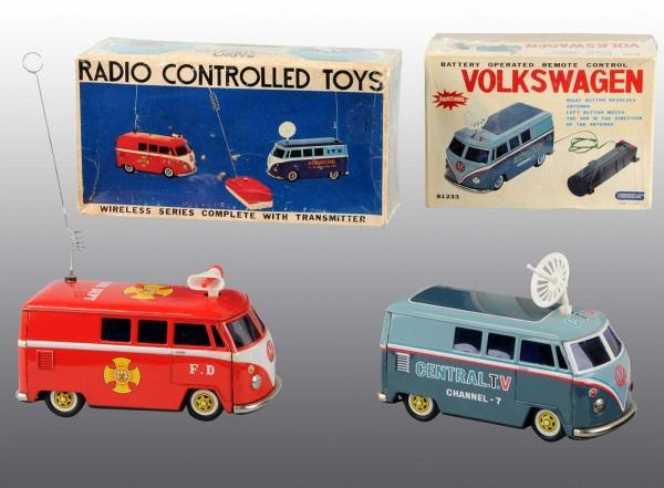 Lot of 2: Tin Volkswagen Bus Battery-Op Toys.: Japanese. Working. Includes one remote control TV Van and one Radio Control Fire Department Van. Very little wear overall. Includes both original boxes with some creasing. Largest: 7 - 1/2" L. (Very G