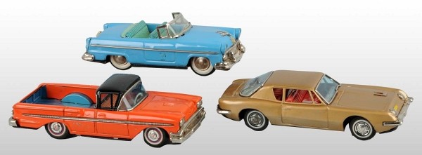 Lot of 3: Tin Litho Car Friction Toys.: Japanese. Working. Includes one 1954 Ford Convertible, one Chevrolet Pickup Truck, and one Avanti. Some scratching and wear, especially to pickup. Largest: 8" L. (Very Good).