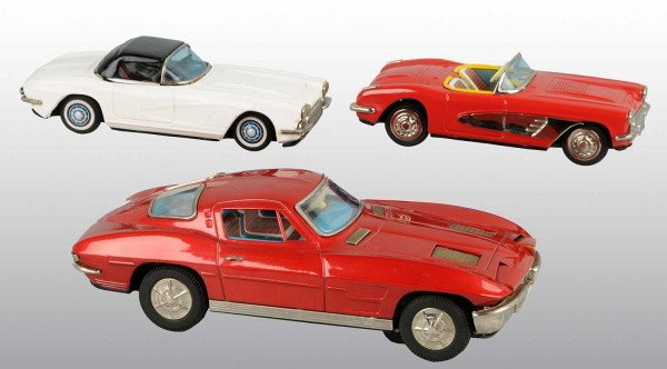 Lot of 3: Tin Litho Corvette Toys.: Japanese. Working. Includes one friction Yonesowa Convertible and two battery-operated hardtops. Larger hardtop is a 1963 Split Window. Some minor scratching and wear. Largest: 11 - 1/2" L. (Very Good