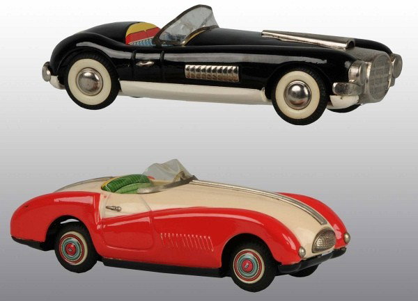 Lot of 2: Tin Litho Cunningham Friction Toys.: Japanese. Working. Both are 1950s convertibles. Very little wear overall but some cracks to plastic windshield on the black car. Largest: 9" L. (Very Good - Excellent).