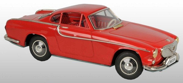 Tin Volvo Coupe Friction Toy.: Japanese. Circa 1950s. Working. Scarce car. Marked "Volvo" on rear of trunk and "Sweden" on license plate. Some scratching and slight spidering to lithography on roof. Car is missing its left front wh