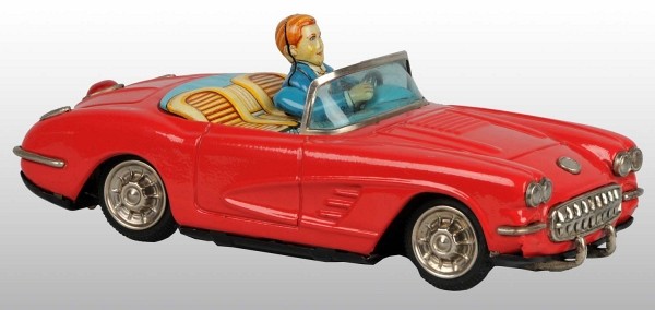Tin Litho 1950s Corvette Battery-Op Toy.: Japanese. Working. Made by Yonesowa. Extremely rare car with driver who opens driver's door when in operation. Some scratching to litho interior. 9 - 3/4" L. (Very Good - Excellent).