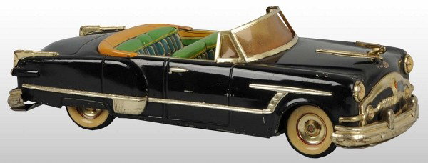 Tin ALPS Packard Convertible Friction Toy.: Japanese. Circa 1953. Working. Original hood ornament, hubcaps marked "Packard", and Packard emblem on front grille. Nice lithographed interior but missing its steering wheel. Chrome has oxidation to 