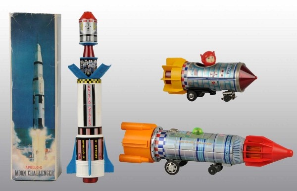 Lot of 3: Tin Space Rocket Battery-Op Toys.: Japanese. Working. Includes one Apollo-X Moon Challenger with original box, one United States Apollo 12, and one NASA Apollo Space Craft. Largest: 17 - 1/2" L. (Very Good).