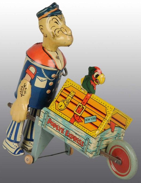 Tin Marx Popeye Express Wind-Up Toy.: American. Working. Stationary parrot variation. Original pipe. Some scratching to Popeye figure around key. 8" T. (Very Good - Excellent).