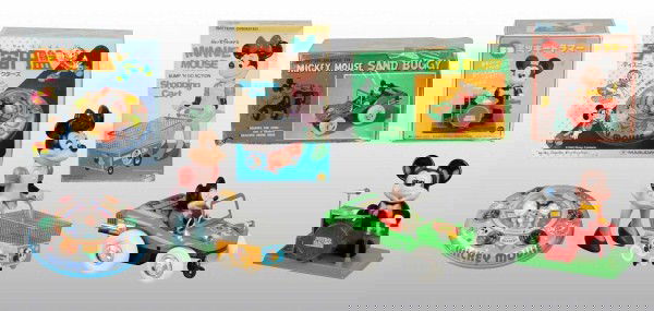 Lot of 4: Walt Disney Character Battery-Op Toys.: Contemporary. Made in Korea, Hong Kong, and Japan. Includes Mickey Mouse Playing Drums, Mickey Mouse in Spaceship, Mickey Mouse in Sand Buggy, and Minnie Mouse Shopping. Includes all original boxes. L