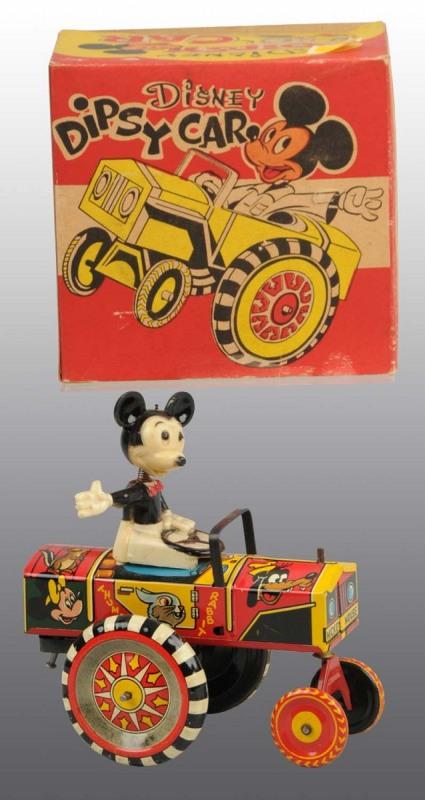 Tin Marx Mickey Mouse Display Car Wind-Up Toy.: Plastic Mickey body. Car has colorful lithograph design. Old store stock from the 1950s. 5 - 1/2" L. (Mint).