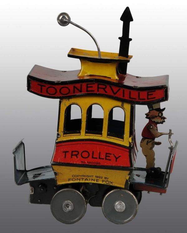 Tin Litho Nifty Toonerville Trolley Wind-Up Toy.: German. Working. Copyright 1922 by Fontaine Fox. Bright, shiny lithography. Replacement stack and pole. 5 - 1/4" x 7". (Excellent).