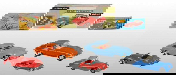 Lot of 5: Tin Sports Car Toys.: Includes one wind-up Schuco Jaguar Micro Racer, one friction Marx Jaguar Coupe, one wind-up Tri-ang Jaguar XK120, one Tri-ang 1950 Jaguar Convertible, and one Korean friction Jaguar Coupe. Some overal