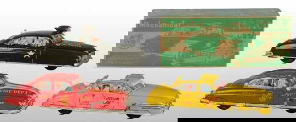 Lot of 3: Tin Litho Marx Automobile Wind-Up Toys.: American. Working. Includes one Yellow Cab, one Fire Department Chief Car, and one US Army Staff Car with battery-operated headlight. Very little wear overall. Includes one original box for the Yellow