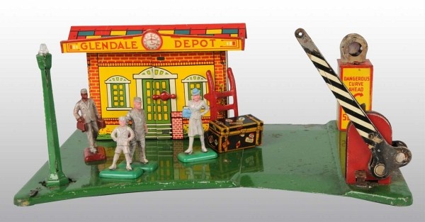 Lot of 2: Pressed Steel Marx Toy Service Stations: American. Includes Roadside Rest with character cutouts which appear to be Laurel and Hardy with oil can, water can, bench, and dolly. Missing glass globes. Also includes Glendale Depot Train Station 