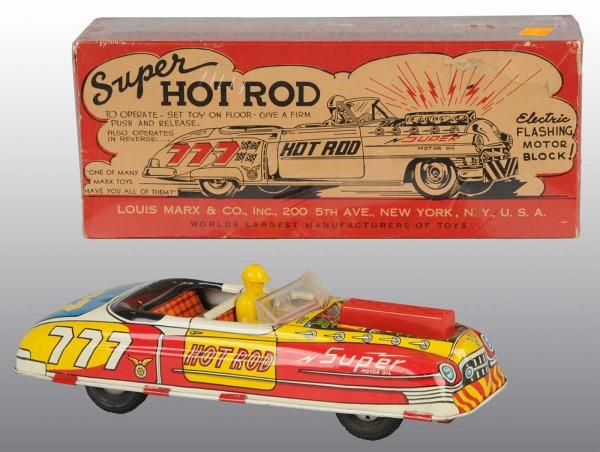 Tin Litho Marx Super Hot Rod Car Friction Toy.: American. Working. With battery-operated light up engine. Original plastic driver and windshield. Marked "777" on trunk and "Hot Rod" on doors. Minor scratching and wear. Includes original box. 11" L.