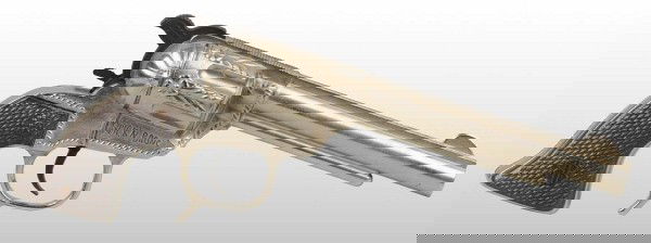 Buck'n Bronc Shooting Iron.: Produced by Schmidt Products. Cap gun is the 50 shot repeater unfired with original patina. Old store stock. 10" L. (Mint).