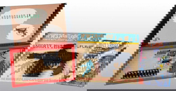 Lot of 3: Toy Guns.: Includes elaborate and very real looking 1970s boxes 38 special with bullets. Toy Machine Gun on card and Bulldog special card. All in mint condition. Old store stock. Largest: 9" x 11". (Excellent).