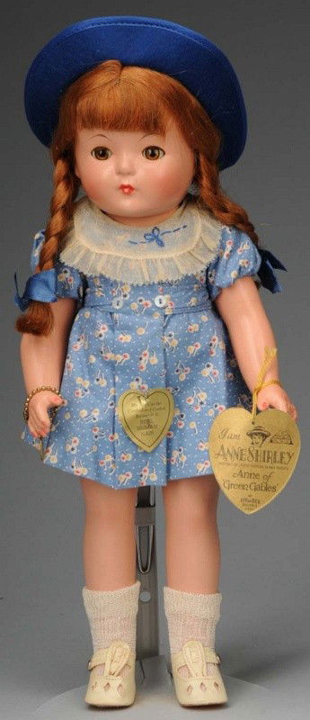 Rare Effanbee Patricia "Anne of Green Gables".: American, 1930s. All composition (light overall crazing), rosy cheeks, closed mouth, clear brown lashed sleeping eyes, original red human hair braids. Factory original blue cotton dress and matching u