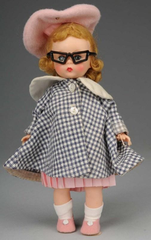 Adorable Madame Alexander Wendy.: American, 1955. All hard plastic bent-knee walker, rosy cheeks, blonde hair, blue eyes. Factory original tagged "Alexander-Kins" outfit with pink taffeta dress and panties, checked coat, pink hat and 