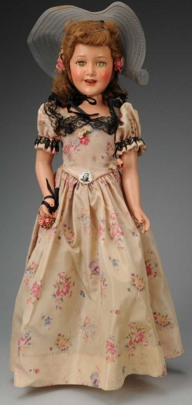 Rare Large Ideal Teenage Star "Deanna Durbin".: American 1939. All composition, brown human hair wig in original set with flowers, sleeping eyes (crackled) with real eyelashes, open mouth with upper teeth, rosy cheeks. Original factory pink taffeta