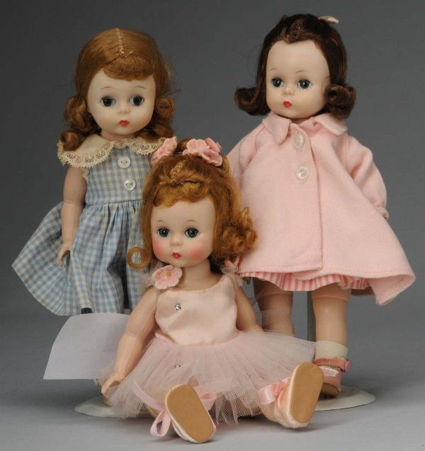 Lot of 3: Madame Alexander Plastic Wendy Dolls.: American, Ca. 1950s. All hard plastic, bent-knee walkers. Wendy #544 Pink Ballerina, rosy cheeks, blonde hair; Wendy #311, tagged blue check gingham dress, panties, shoes, socks, and blonde hair with