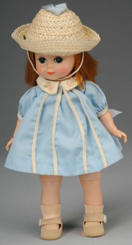 Cute Madame Alexander Maggie Mix-Up.: American, 1961. All hard plastic bent knee walker, straight red hair, green eyes, freckles, closed mouth. Blue cotton dress and panties (no tag), hat, shoes and socks. 8" T. (Excellent).