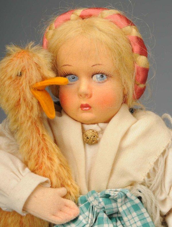 Darling Lenci Goose Girl.: Italy, Ca. 1930s. Girl with blonde mohair wig with ribbon braid encircling head, blue side-glancing eyes, rosy cheeks, all original in peasant costume with felt skirt and green plaid apron, carrying h