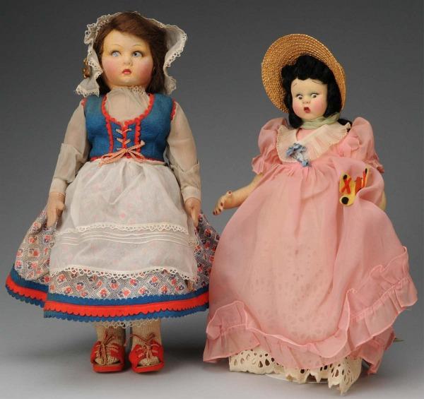 Two Lenci-Type Cloth Dolls.: Italian, Ca. 1930s. Peasant girl with molded felt face, with painted side-glancing eyes, brown hair wig, colorful peasant outfit with Sacat, Torino label. Girl with a surprised look, molded felt face,