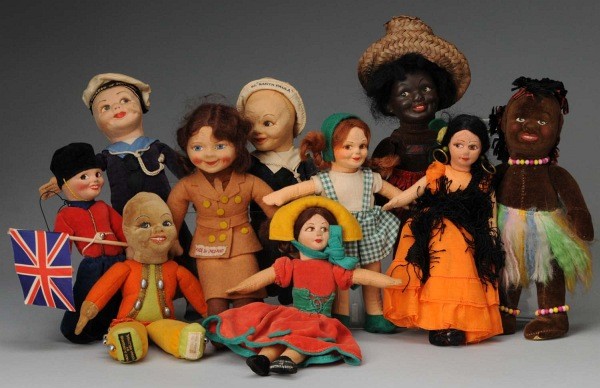 Lot of 10: Cloth Dolls Souvenir Dolls.: England, Ca. 1930-1950. All Cloth with character faces. English lady soldier, gaucho, sailor SS Empress of Scotland, sailor SS Santa Paula, 2 South Seas Islanders one with composition face, one a Merr