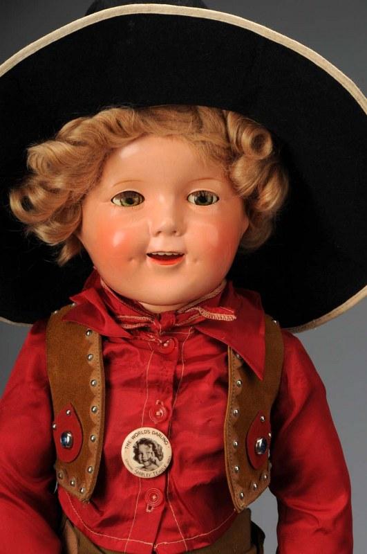 Child Star Shirley Temple Ideal Composition Doll.: American, Ca. 1930s. Marked on head and body. Cute face with rosy cheeks (overall crazing), flirty eyes (one crackled) with real upper eyelashes, painted lower lashes, dimples, open mouth with upper t