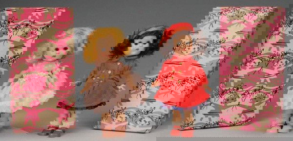 Lot of 2 Boxed Vogue Ginny Dolls.: American, Ca. 1950s. Both hard plastic. 1955 Molded lash walker with blonde hair, rosy cheeks wearing pink nylon dress #82 "BonBons" in Vogue box #6101 Undressed Walking Doll/Bangs/BL. 1957 Molded las