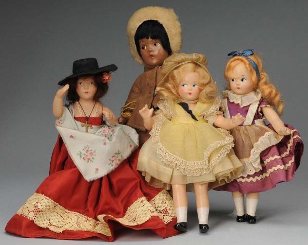 Lot of 4: Composition Dolls.: American, Ca. 1930-1940s. 2 Madame Alexander "Little Betty" dolls with blonde mohair wigs and painted blue side-glancing eyes, molded white socks and black shoes: March Birthday Doll with all original