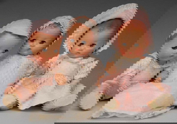 Lot of 3: Effanbee Composition Dolls.: American, Ca. 1930s. All composition, Pair of wonderful "Patsy Babyette" twins with molded hair, rosy cheeks, clear sleeping eyes with upper lashes, tiny closed mouth, all original in matching pink an