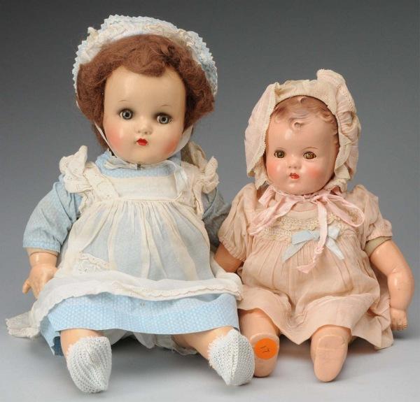 Lot of 2: Composition Baby Dolls.: American, Ca. 1940. Ideal baby with molded curly hair, brown lashed sleeping eyes (one crackled), open/closed mouth with painted teeth, cloth body, compo limbs (much wear and crazing), original dress,