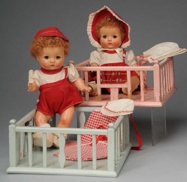 Lot of Darling Effanbee "Patsy Babyette" Twins.: American, Ca. 1930s. All composition babies (some light crazing) with reddish caracul wigs, clear lashed blue sleeping eyes, rosy cheeks, closed mouths, dressed in original red and white matching outf