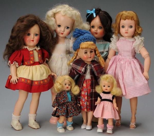 Lot of 7: Hard Plastic Dolls.: American, Ca. 1950s. Nancy Ann strung "Muffie," redressed; Nancy Ann "Muffie" walker, dress may be original; Duchess Doll with wrist tag, all original with added coat and hat; Alexander "Elise," origi