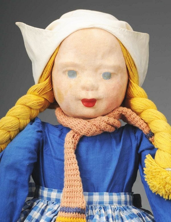 WPA Milwaukee Project Cloth "Dutch Girl" Doll.: American, Ca. 1930s. Molded stockinette face with painted features, rosy cheeks, original yellow yarn hair with braids, cloth body with tabbed arms and unique hip joints, all original "Dutch" costume 