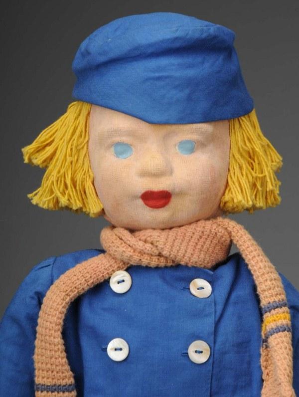 Rare WPA Milwaukee Project Cloth "Dutch Boy" Doll: American, Ca. 1930s. Molded stockinette face with painted features, rosy cheeks, original yellow yarn bobbed hair, cloth body with tabbed arms and unique hip joints, all original "Dutch" costume with 