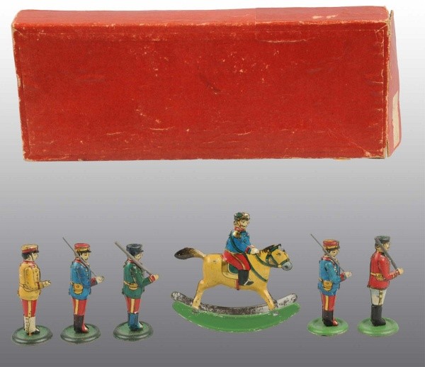 Lot of 6: Tin Litho Soldier Penny Toys.: Japanese. Pre-war. Extremely unusual. Includes one soldier on horseback rocker toy and five marching soldiers holding rifles, one with missing tin rifle. Very nice and colorful lithography throughout.