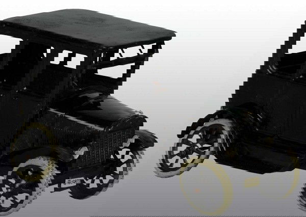 Tin Bing Large Sedan Wind-Up Toy.: German. Working. Lithographed female driver. Some minor paint loss and wear throughout. 8" L. (Very Good).