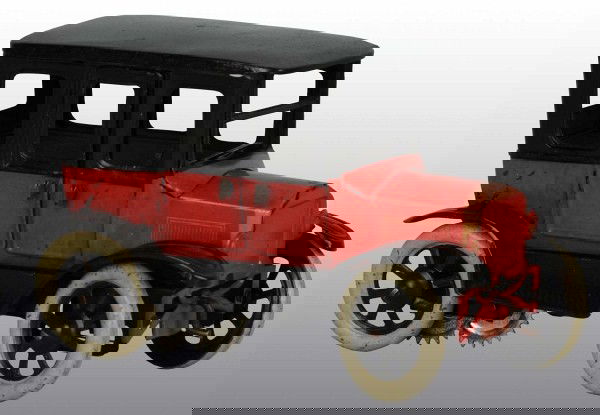 Tin Orobr Car Wind-Up Toy: German. Working. Scarcer red color variation of the sedan with opening doors. Crank in front and spare tire in rear. Minor paint touchup to roof and some scratching above right rear fender. 6" L. (Ver